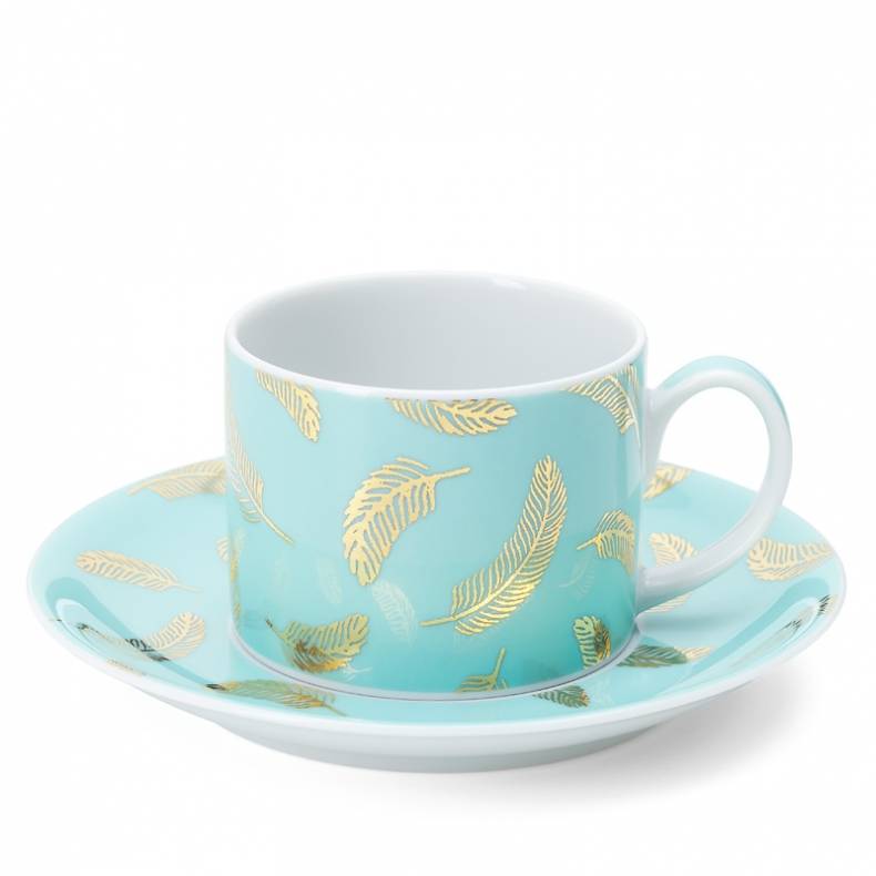 Turquoise tea cup and saucer