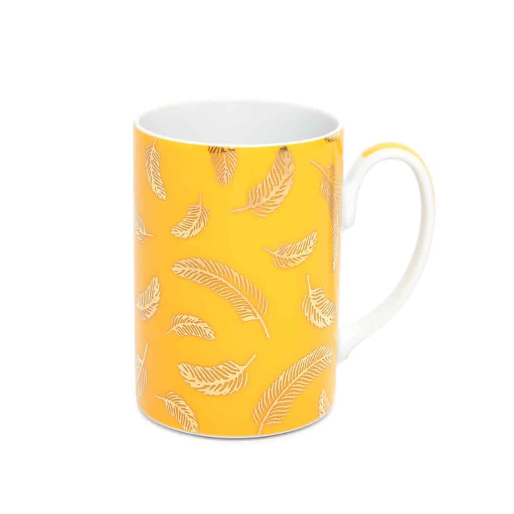 Yellow mug with feathers