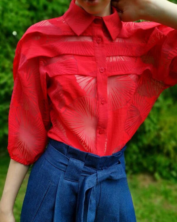 Red blouse with etched pattern and folded chest